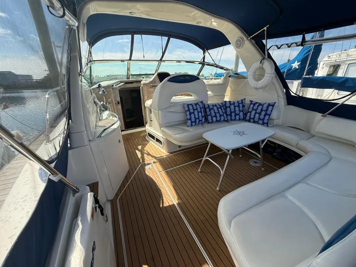 Yacht Photos Pics Luxurious 2003 Sea Ray 380 Sundancer yacht interior with elegant seating and nautical decor.