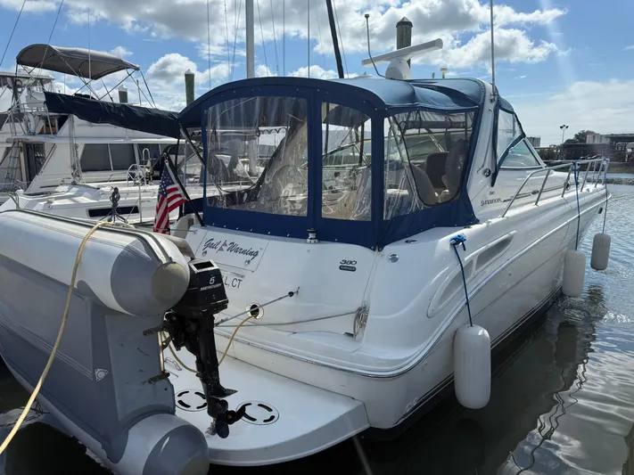  Yacht Photos Pics 2003 Sea Ray 380 Sundancer yacht docked at marina under blue sky.