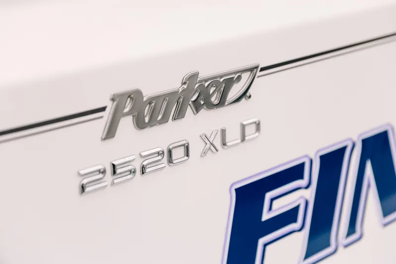  Yacht Photos Pics 2017 Parker 2520 XLD Sport Cabin boat emblem close-up.
