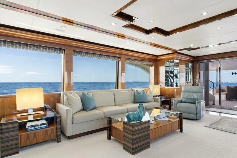 Mesmerize Yacht Photos Pics Luxurious interior of 2013 Hargrave 125 Raised Pilothouse yacht with ocean view.
