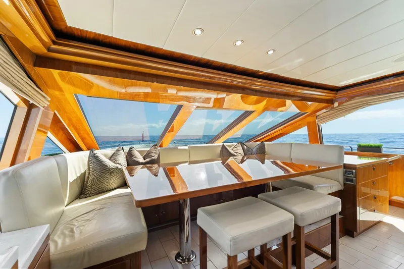 Mesmerize Yacht Photos Pics Luxurious interior of 2013 Hargrave 125 Raised Pilothouse yacht with ocean view.