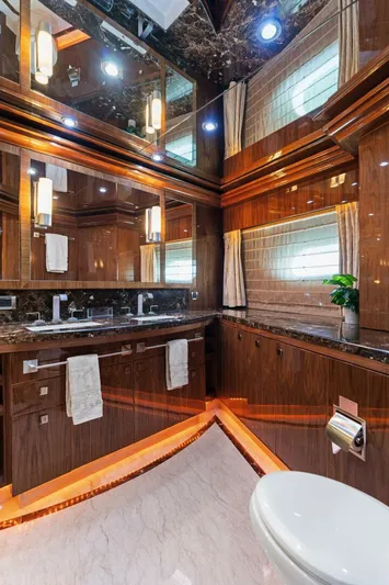 Mesmerize Yacht Photos Pics Luxurious bathroom in 2013 Hargrave 125 Raised Pilothouse yacht with elegant wood finishes.