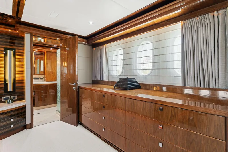 Mesmerize Yacht Photos Pics Luxurious interior of 2013 Hargrave 125 Raised Pilothouse yacht with elegant wood finishes.