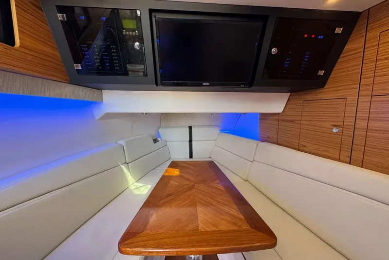 True Story Yacht Photos Pics Luxurious interior of 2022 Boston Whaler 380 Realm with elegant seating and modern amenities.