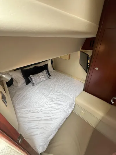 Viva La Vida Yacht Photos Pics 2006 Sea Ray 44 Sedan Bridge cabin with cozy bed and modern decor.