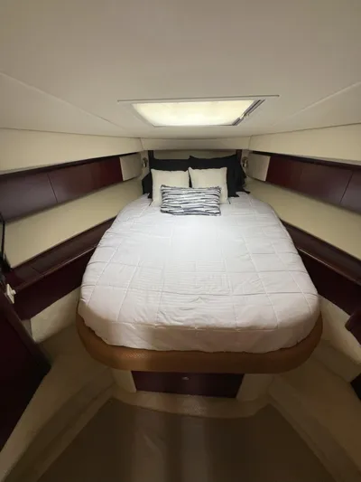 Viva La Vida Yacht Photos Pics Interior cabin of 2006 Sea Ray 44 Sedan Bridge with cozy bed and skylight.