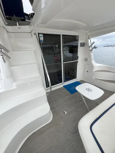 Viva La Vida Yacht Photos Pics 2006 Sea Ray 44 Sedan Bridge yacht with spacious deck and sliding glass doors.