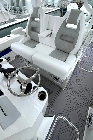  Yacht Photos Pics 2024 Reef Runner 340 boat interior with dual seating and modern steering console.