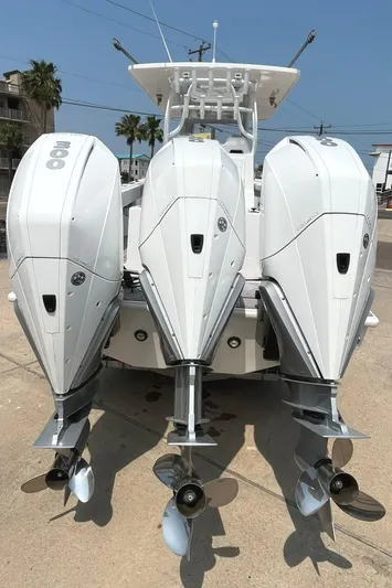  Yacht Photos Pics 2024 Reef Runner 340 boat with triple outboard engines.