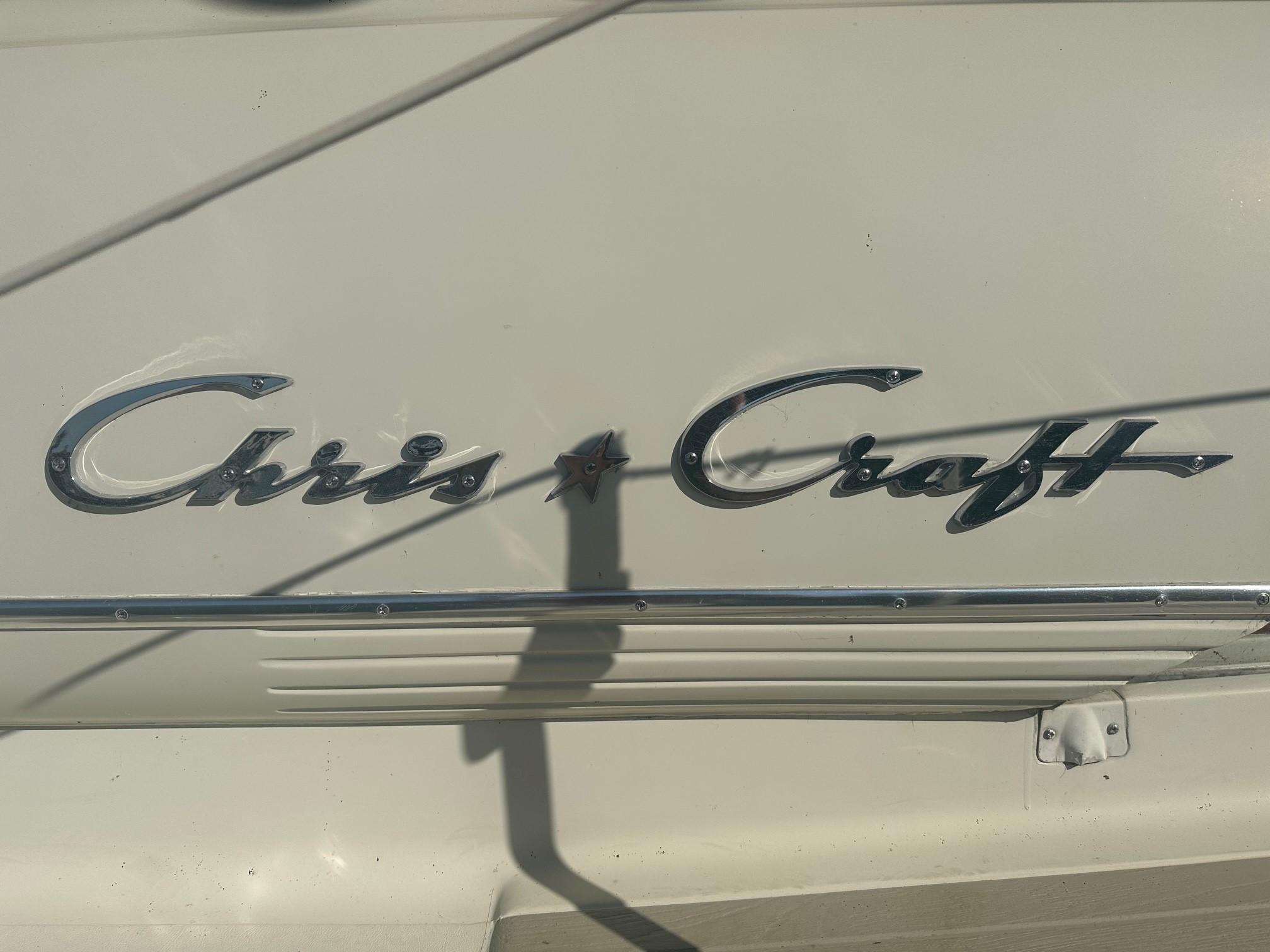 Chris-Craft 35 Commander 1968 emblem on boat hull.