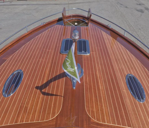  Yacht Photos Pics J Craft Torpedo 42, 2010 model, showcasing polished wooden deck and chrome details.