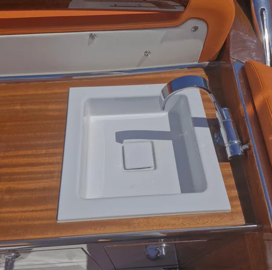  Yacht Photos Pics Luxury sink on J Craft Torpedo 42 yacht, featuring sleek design and modern faucet.