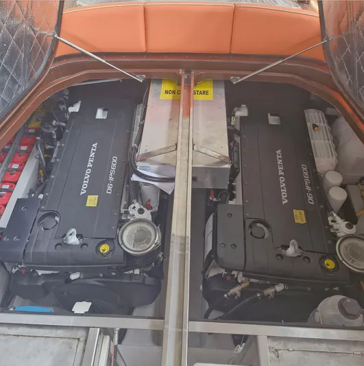 Yacht Photos Pics Engine compartment of a 2010 J Craft Torpedo 42 with Volvo Penta engines.
