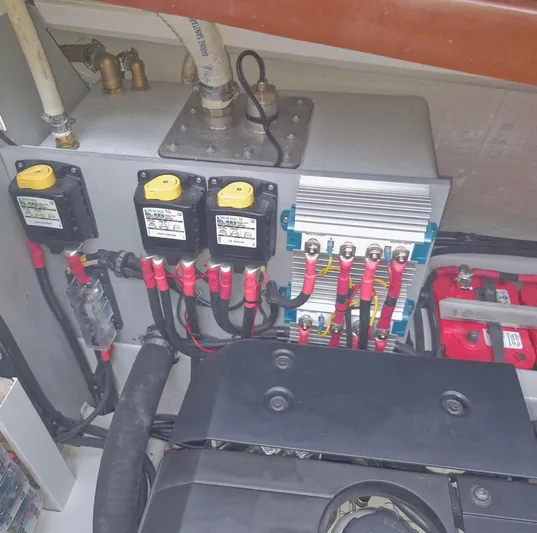  Yacht Photos Pics Engine compartment of a 2010 J Craft Torpedo 42 with electrical components and wiring.