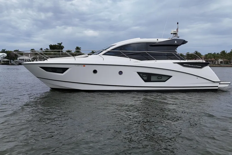 On My Way Yacht Photos Pics 2018 Beneteau Gran Turismo 50 yacht on calm water under cloudy sky.