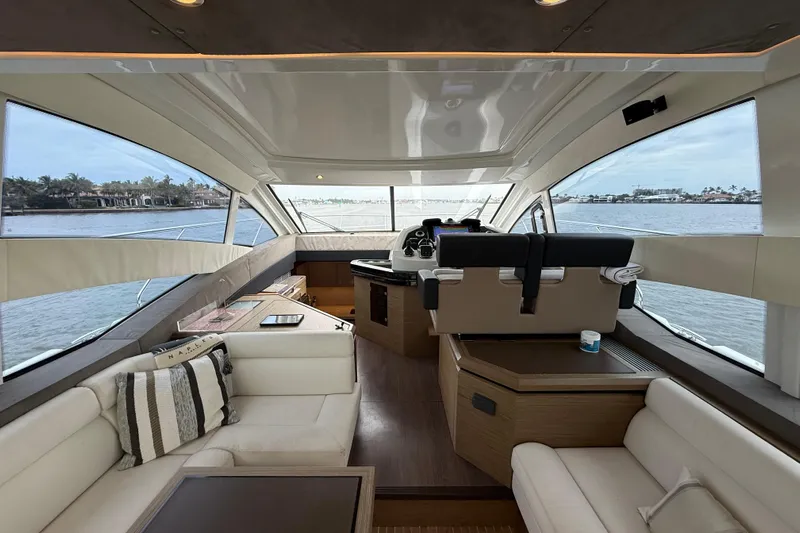 On My Way Yacht Photos Pics Luxurious interior of 2018 Beneteau Gran Turismo 50 yacht with panoramic windows.