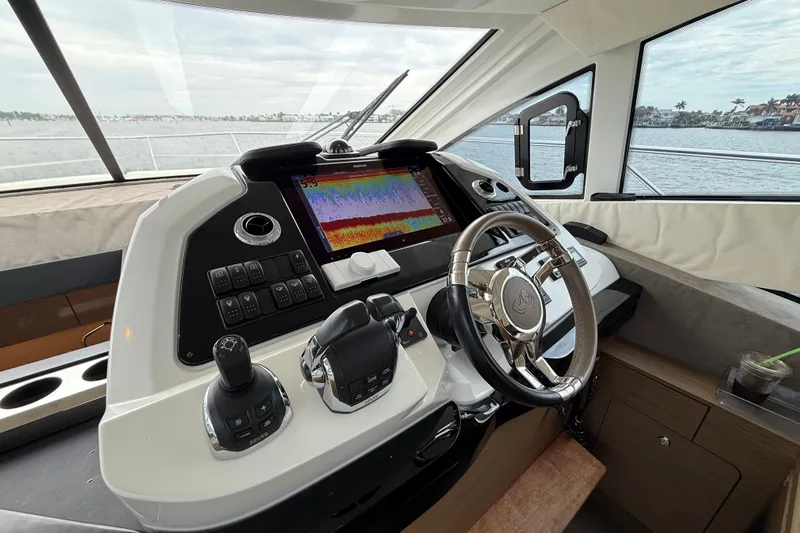On My Way Yacht Photos Pics Helm of 2018 Beneteau Gran Turismo 50 yacht with advanced navigation controls.