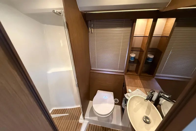 On My Way Yacht Photos Pics Luxurious bathroom in 2018 Beneteau Gran Turismo 50 yacht with modern fixtures.