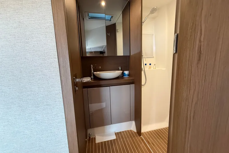 On My Way Yacht Photos Pics Luxurious bathroom in 2018 Beneteau Gran Turismo 50 yacht with modern fixtures.