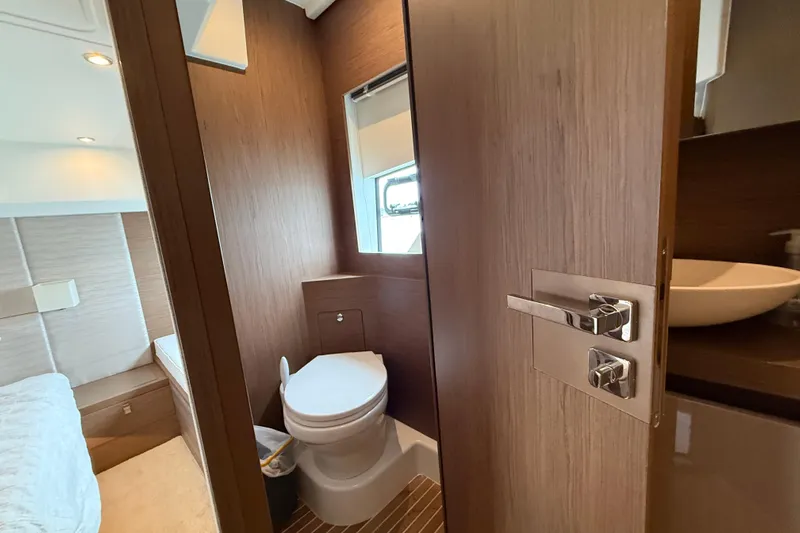 On My Way Yacht Photos Pics Luxurious bathroom interior of 2018 Beneteau Gran Turismo 50 yacht, featuring modern fixtures.