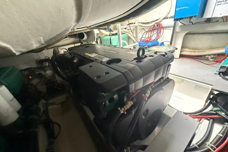 On My Way Yacht Photos Pics Engine room of 2018 Beneteau Gran Turismo 50 yacht, showcasing machinery and equipment.