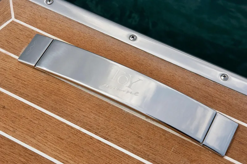 Yacht Photos Pics Stainless steel handle on Toy 36 yacht, 2025 model, with teak decking.