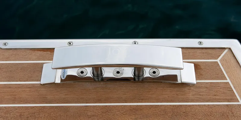 Yacht Photos Pics Sleek chrome boat cleat on wooden deck, Toy 36 model, 2025.