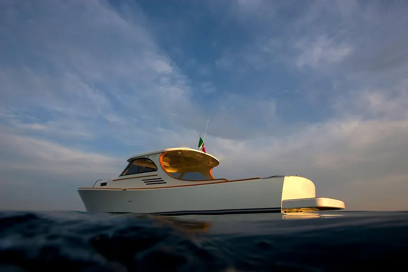  Yacht Photos Pics Luxury Toy 36 yacht on calm sea under a clear sky, 2025 model.