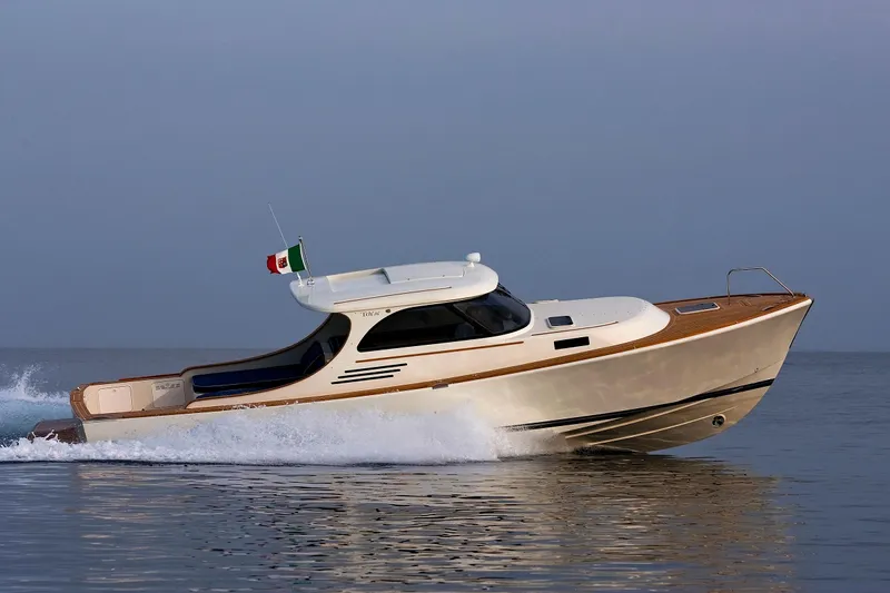  Yacht Photos Pics Luxury Toy 36 yacht cruising on calm waters, 2025 model.