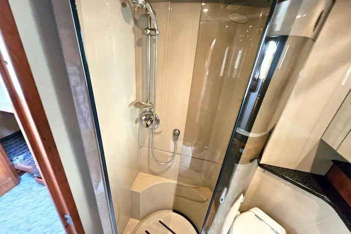  Yacht Photos Pics Luxurious bathroom in 2006 Cruisers Yachts 455 Express Motoryacht with modern shower.