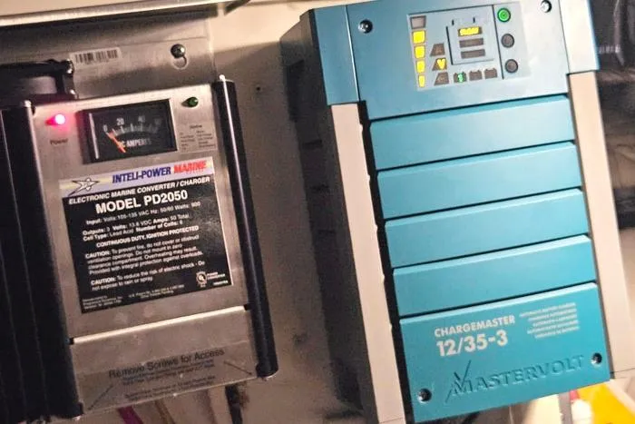  Yacht Photos Pics 2006 Cruisers Yachts 455 Express Motoryacht electrical panel with marine converters and chargers.