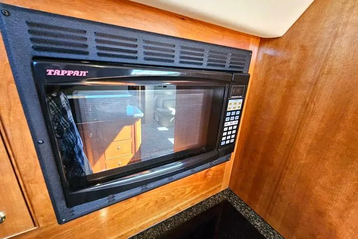  Yacht Photos Pics Tappan microwave in 2006 Cruisers Yachts 455 Express Motoryacht kitchen.