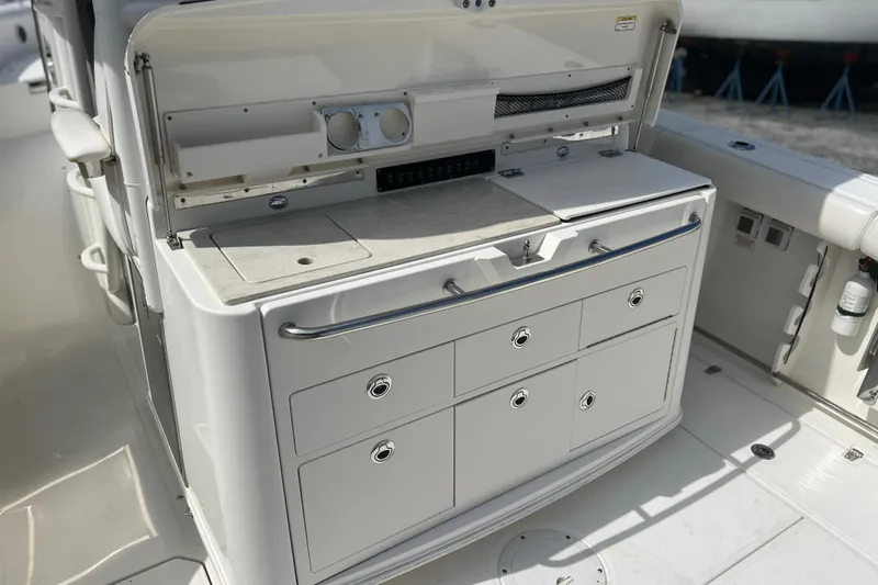  Yacht Photos Pics 2014 Boston Whaler 350 Outrage Summer Kitchen Leaning Post open, looking from port side