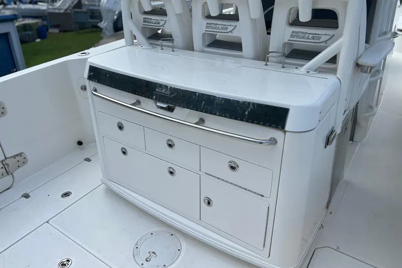  Yacht Photos Pics 2014 Boston Whaler 350 Outrage Summer Kitchen Leaning Post closed, looking from starboard side