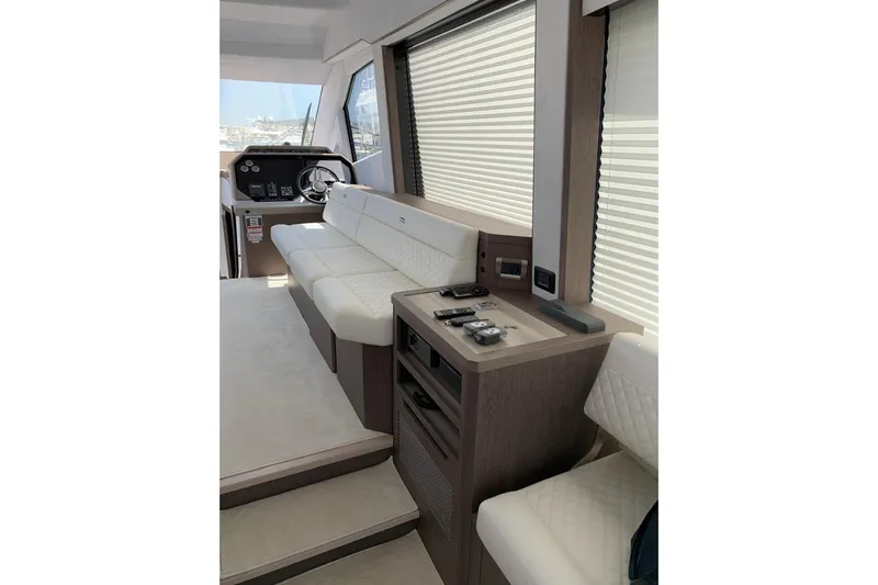  Yacht Photos Pics Interior of 2019 Galeon 500 Fly yacht with modern seating and control panel.