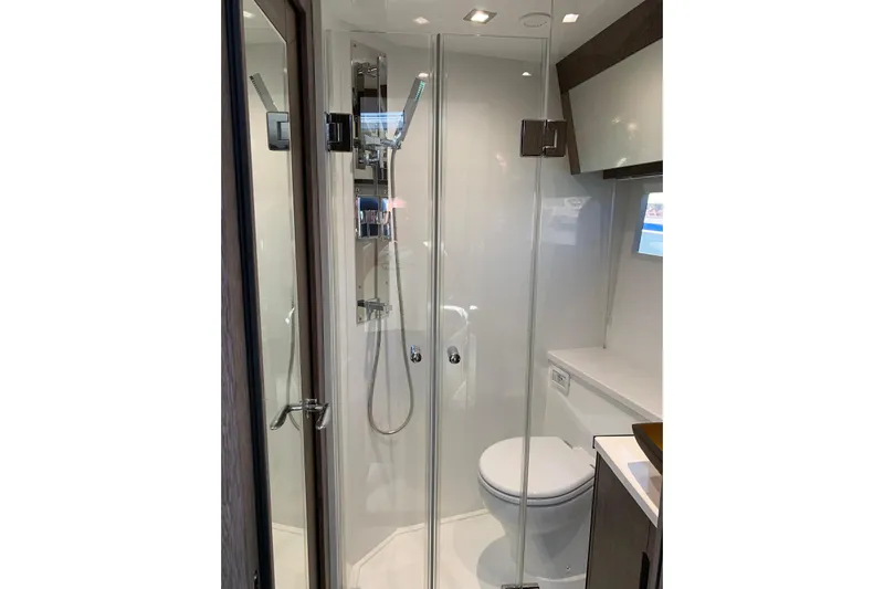 Yacht Photos Pics Modern bathroom in 2019 Galeon 500 Fly yacht with glass shower and sleek design.