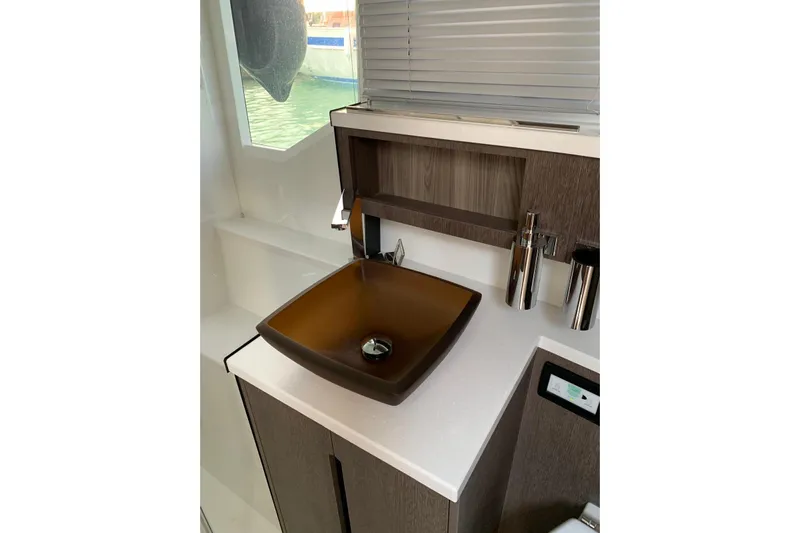  Yacht Photos Pics Luxurious bathroom sink on 2019 Galeon 500 Fly yacht, featuring modern design and elegant fixtures.