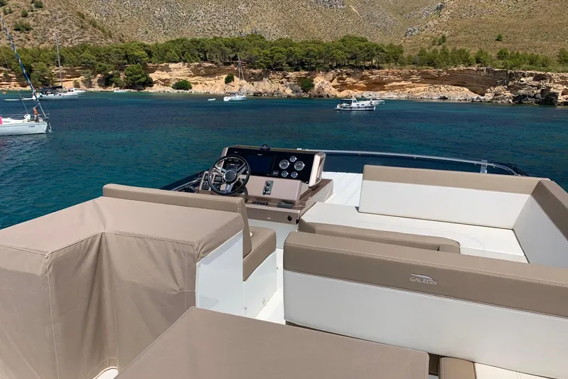  Yacht Photos Pics 2019 Galeon 500 Fly yacht interior with scenic coastal view.