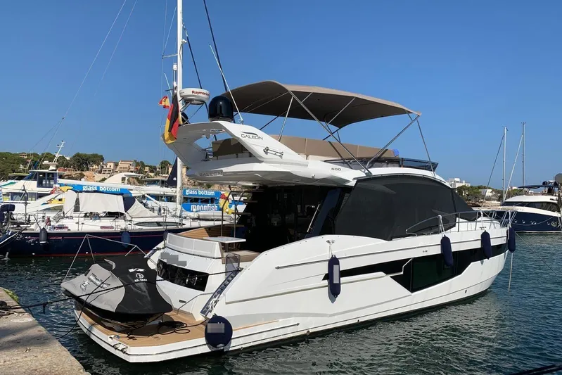  Yacht Photos Pics 2019 Galeon 500 Fly yacht docked in harbor, sunny day.