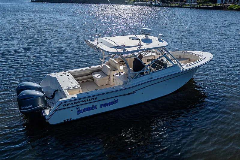 Sundae Funday Yacht Photos Pics 2017 Grady-White Freedom 307 boat on water, featuring dual Yamaha engines.