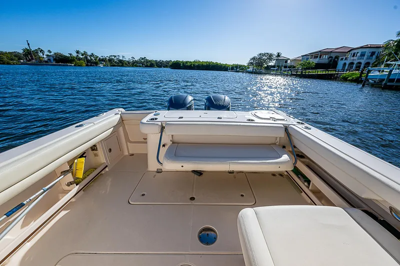 Sundae Funday Yacht Photos Pics 2017 Grady-White Freedom 307 boat interior with scenic waterfront view.