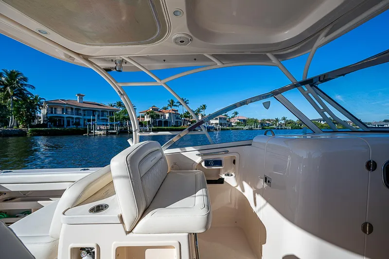 Sundae Funday Yacht Photos Pics 2017 Grady-White Freedom 307 boat interior with waterfront view.