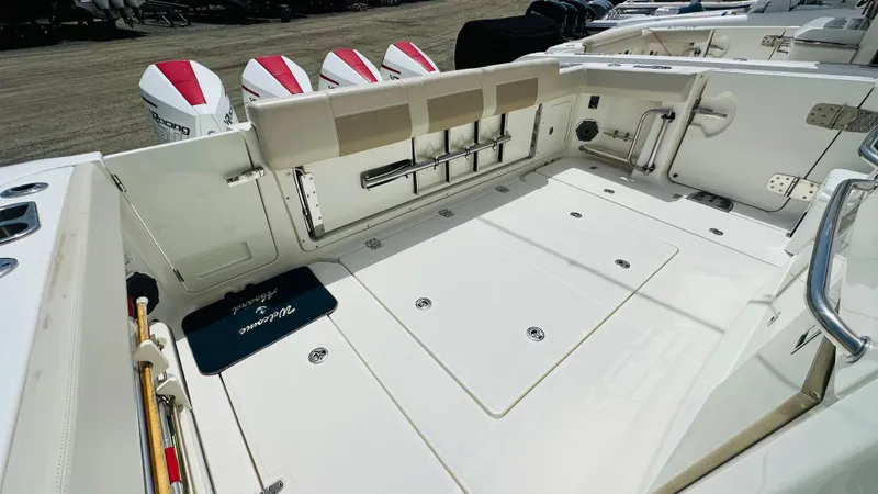 Twin J Yacht Photos Pics 2021 Boston Whaler 420 Outrage boat deck with multiple outboard engines.