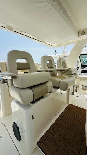 Twin J Yacht Photos Pics Luxury seating on 2021 Boston Whaler 420 Outrage boat, featuring plush, ergonomic design.