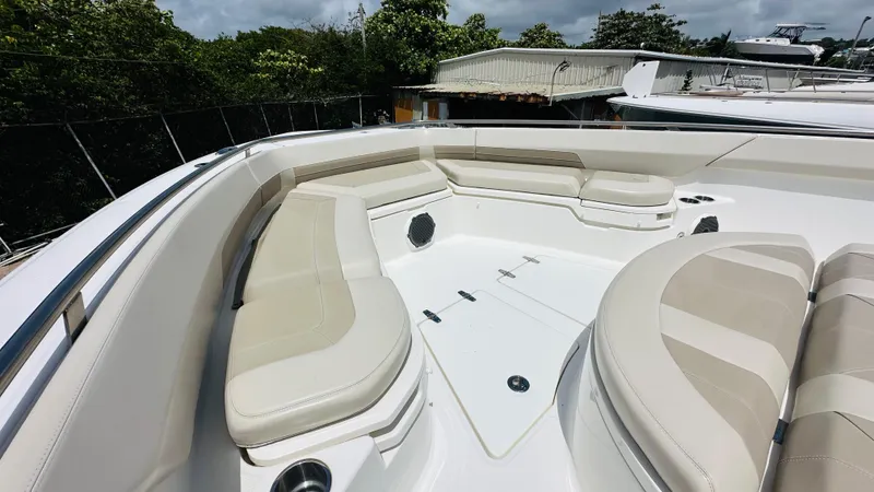 Twin J Yacht Photos Pics 2021 Boston Whaler 420 Outrage boat interior with spacious seating and modern design.