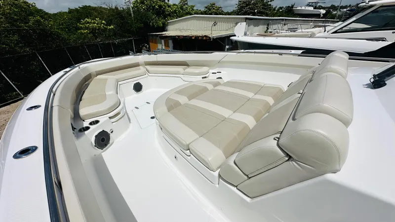 Twin J Yacht Photos Pics 2021 Boston Whaler 420 Outrage boat with spacious, luxurious seating area.