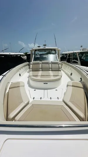 Twin J Yacht Photos Pics 2021 Boston Whaler 420 Outrage boat with spacious seating and sleek design.