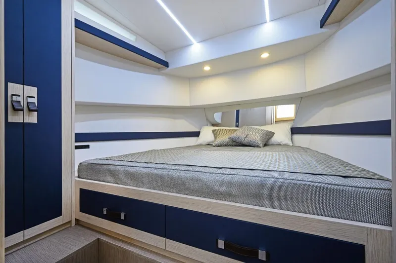  Yacht Photos Pics Luxurious cabin interior of 2025 Apreamare GOZZO 35 yacht with modern design.