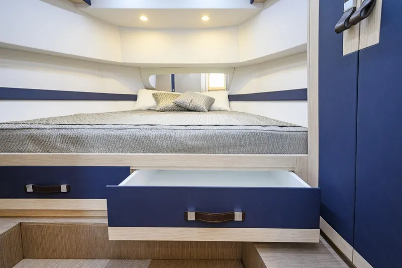  Yacht Photos Pics Interior of 2025 Apreamare GOZZO 35 yacht with bed and open drawer.