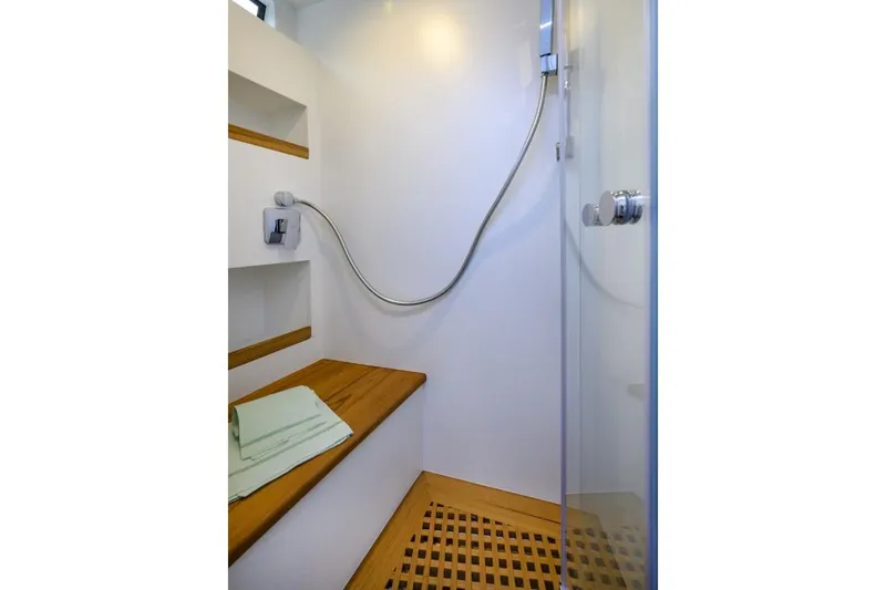  Yacht Photos Pics Modern shower area in 2025 Apreamare GOZZO 35 yacht with wooden accents.